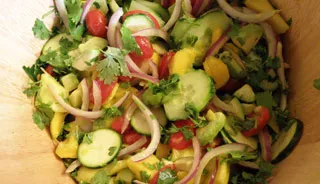 Salade a la mangue et sa vinaigrette au citron