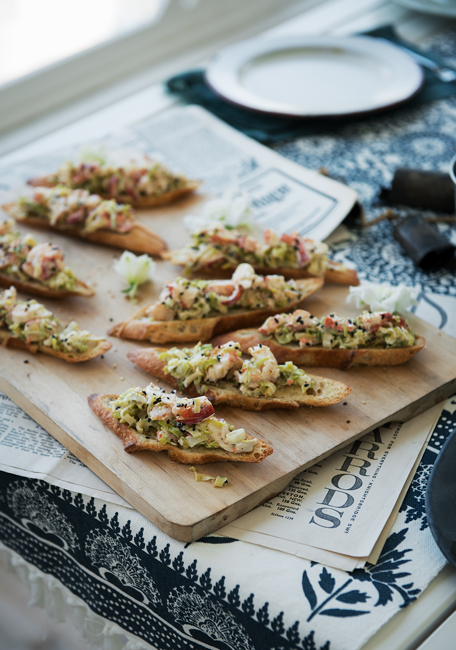 Croûtons de chair de homard, poireau & sésame