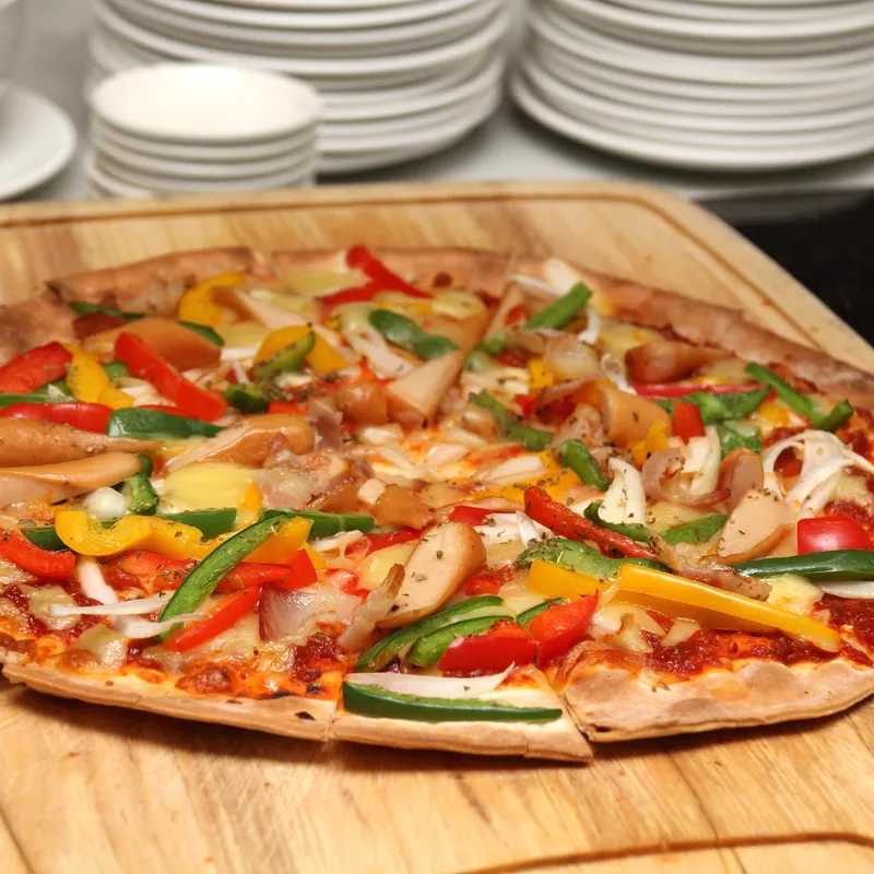 Pizza au poulet sur tortillas